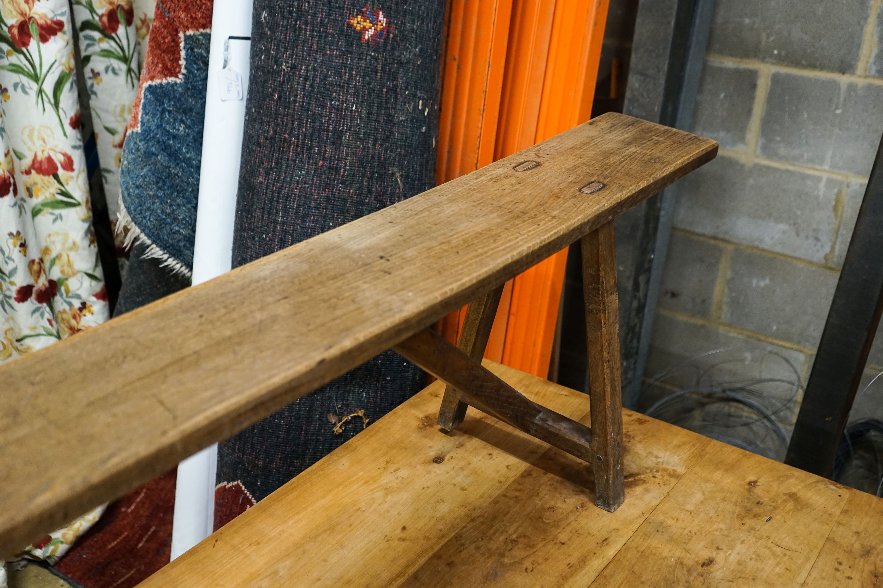 A 19th century French provincial oak bench seat, length 194cm, depth 30cm, height 42cm